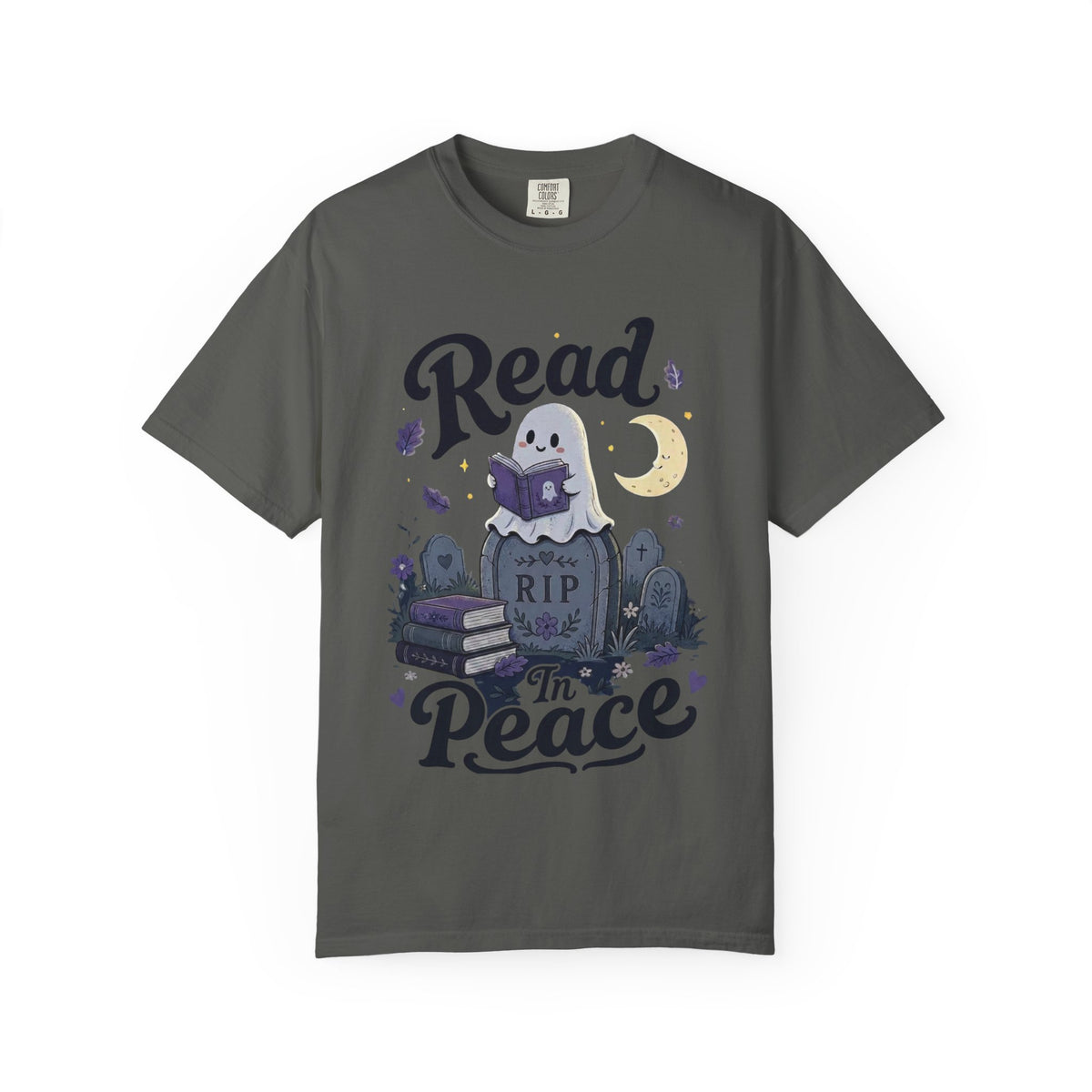 A dark gray short-sleeve crewneck t-shirt featuring a cute Halloween graphic of a ghost reading a book on top of a tombstone that says 'RIP', with the words 'Read In Peace' written in stylized lettering.