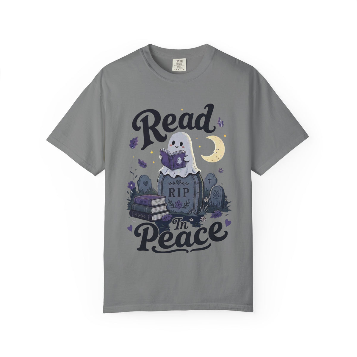A gray short-sleeve crewneck t-shirt featuring a cute Halloween graphic of a ghost reading a book on top of a tombstone that says 'RIP', with the words 'Read In Peace' written in stylized lettering.
