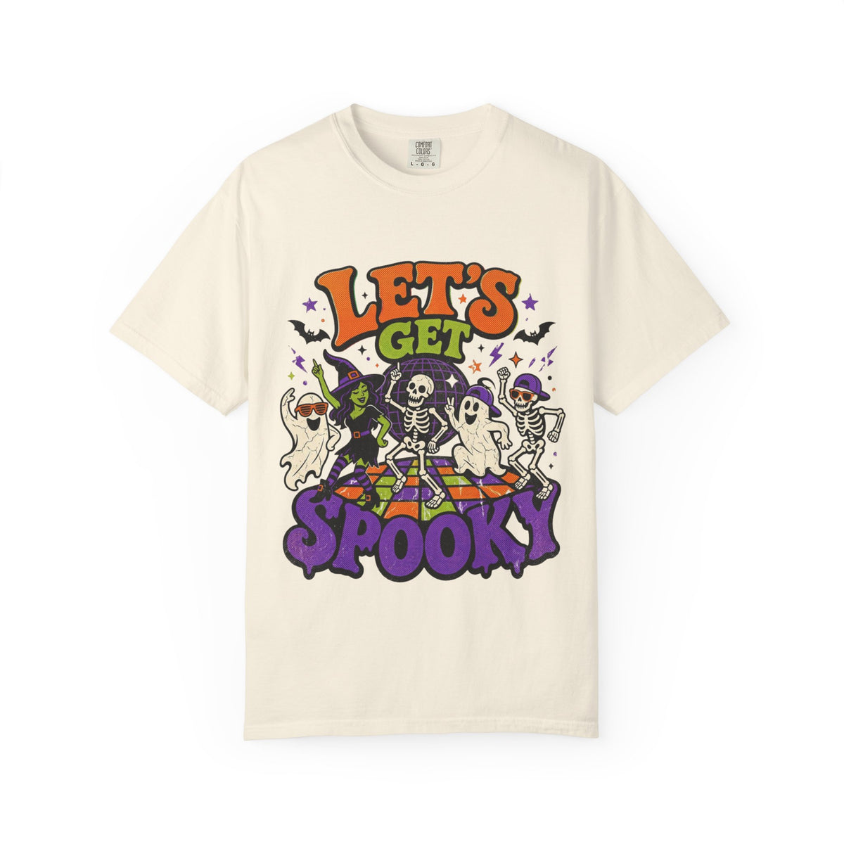 An off-white short-sleeve crewneck t-shirt featuring a colorful Halloween graphic on the front with the text 'LET'S GET SPOOKY' and cartoon ghosts, skeletons, a witch, and bats.