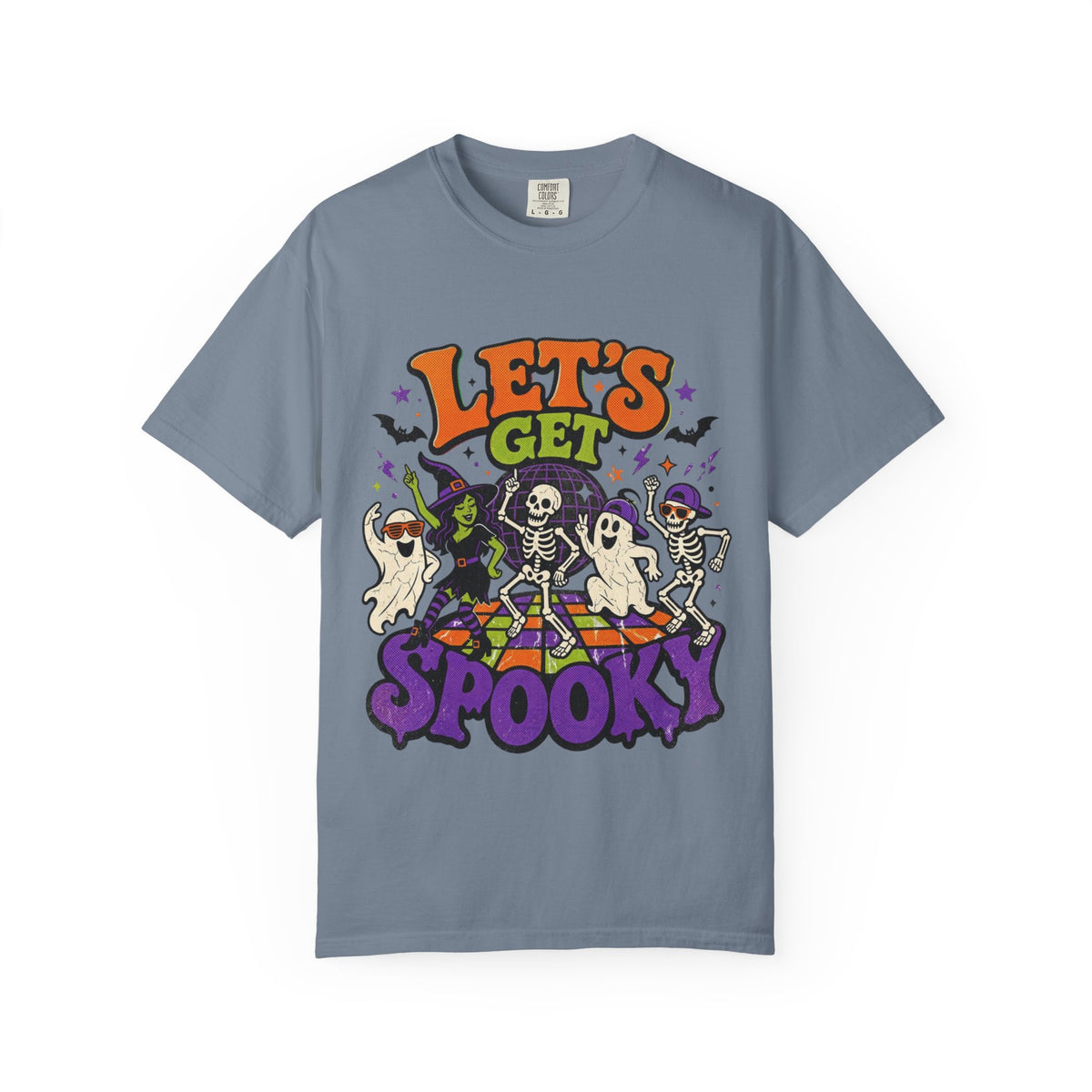 A slate blue short-sleeve crewneck t-shirt featuring a colorful Halloween graphic on the front with the text 'LET'S GET SPOOKY' and cartoon ghosts, skeletons, a witch, and bats.