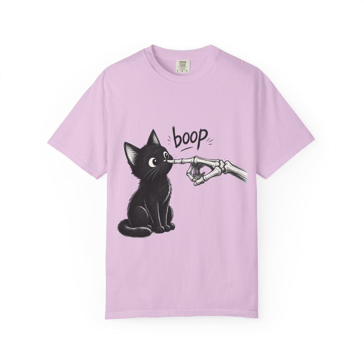 A pink short-sleeve crewneck t-shirt featuring a black graphic of a black cat being tapped by a skeletal hand with the word 'boop' written above, displayed on a clean pink background.
