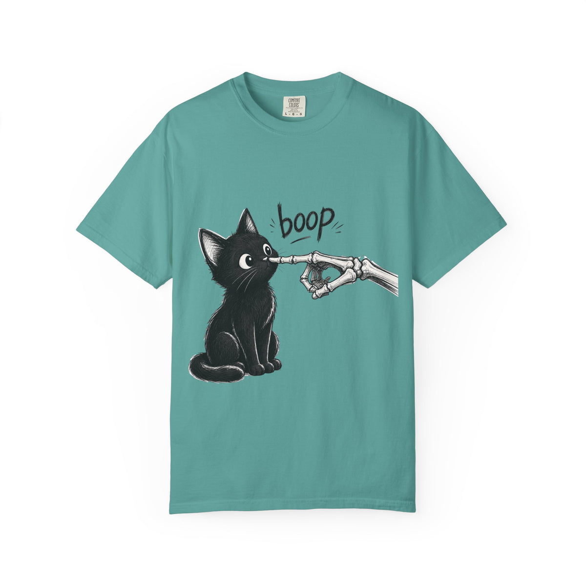 A teal short-sleeve crewneck t-shirt featuring a black graphic of a black cat being tapped by a skeletal hand with the word 'boop' written above, displayed on a clean teal background.