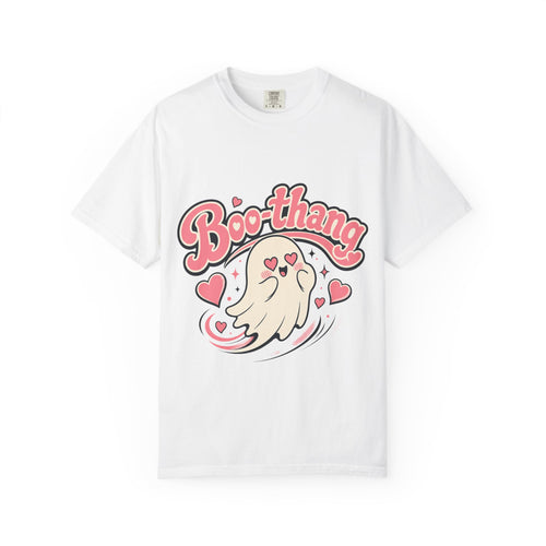 A white short-sleeve crewneck t-shirt featuring a cartoon graphic of a ghost with pink hearts and the word 'Boo-thang' in pink script across the chest.