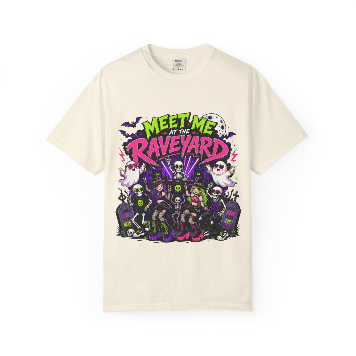 An off-white short-sleeve crewneck t-shirt featuring a colorful graphic print on the front with the text 'MEET ME AT THE RAVEYARD' and a group of cartoon-style gothic characters.