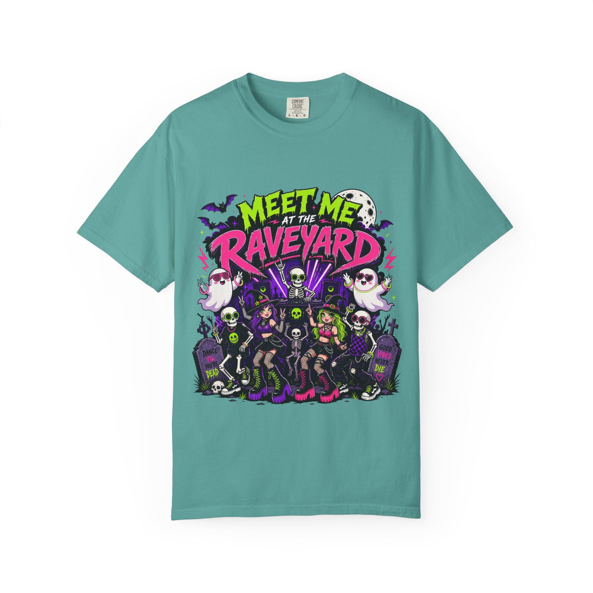 A teal short-sleeve crewneck t-shirt featuring a colorful graphic print on the front with the text 'MEET ME AT THE RAVEYARD' and a group of cartoon-style gothic characters.