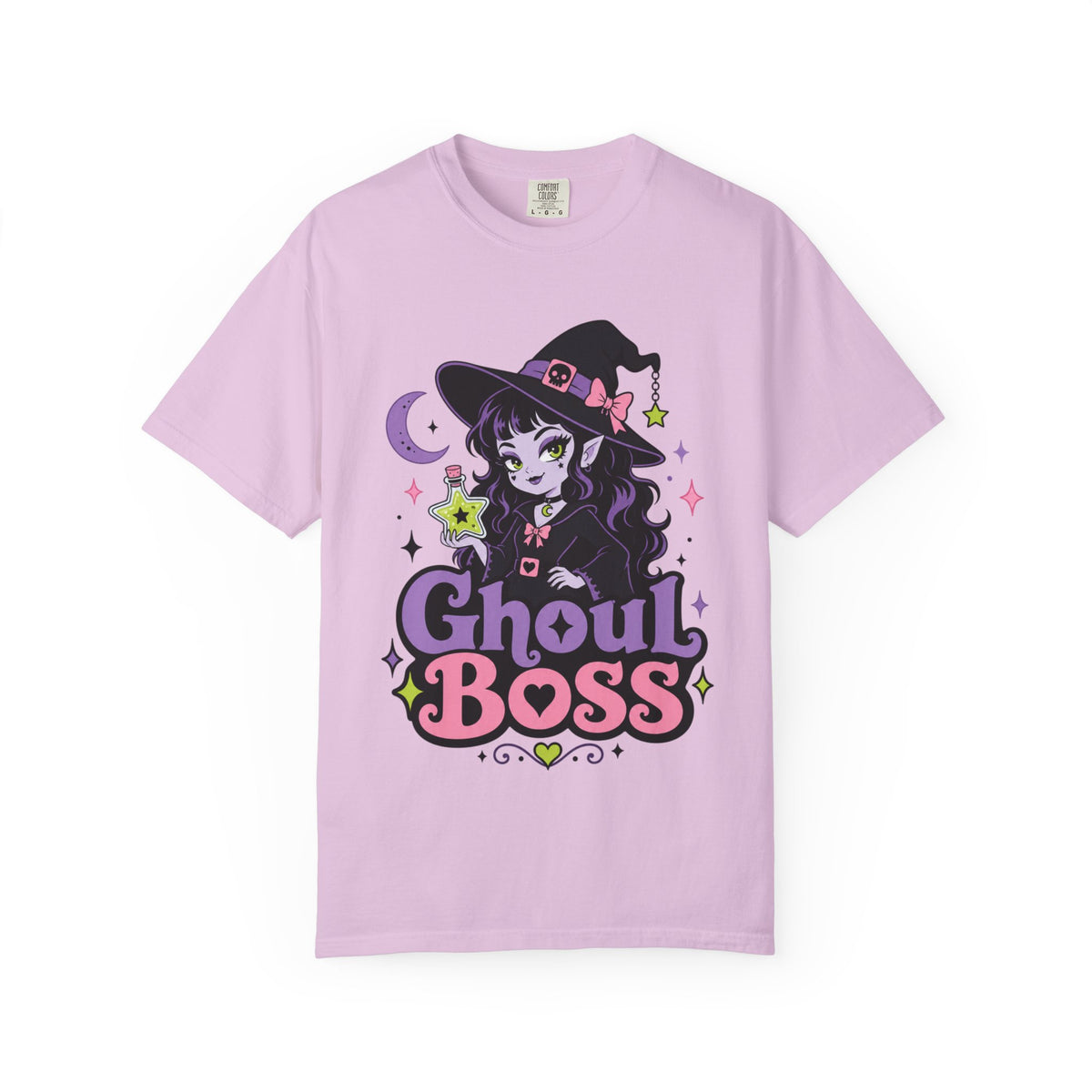 A pink short-sleeve crewneck t-shirt featuring a colorful graphic of a cute anime-style witch girl with the text 'Ghoul BOSS' in purple and pink.