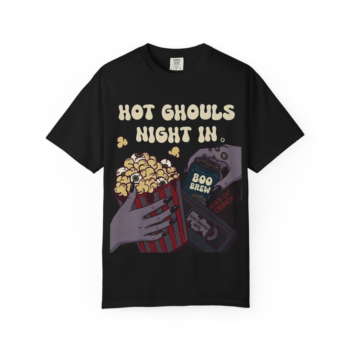 A black crewneck t-shirt featuring a graphic print of hands holding a bucket of popcorn, soda and a cassette tape beneath the text 'HOT GHOULS NIGHT IN'.