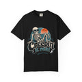 A black short-sleeve crewneck t-shirt featuring a retro graphic of a skeleton sitting next to an orange sun, with the text 'Creepin' it real' printed below.