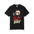 A black short-sleeve crewneck t-shirt featuring a graphic print of a cute halloween character holding a coffee cup with the text 'SLAY THE DAY' in red and beige lettering.