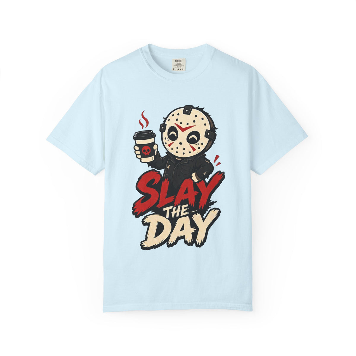 A light blue short-sleeve crewneck t-shirt featuring a graphic print of a cute halloween character holding a coffee cup with the text 'SLAY THE DAY' in red and beige lettering.