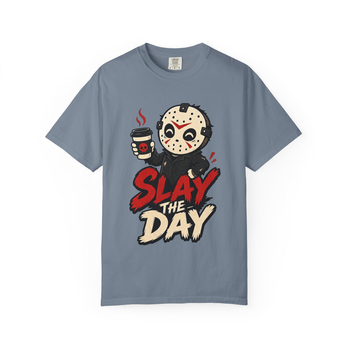 A slate blue short-sleeve crewneck t-shirt featuring a graphic print of a cute halloween character holding a coffee cup with the text 'SLAY THE DAY' in red and beige lettering.