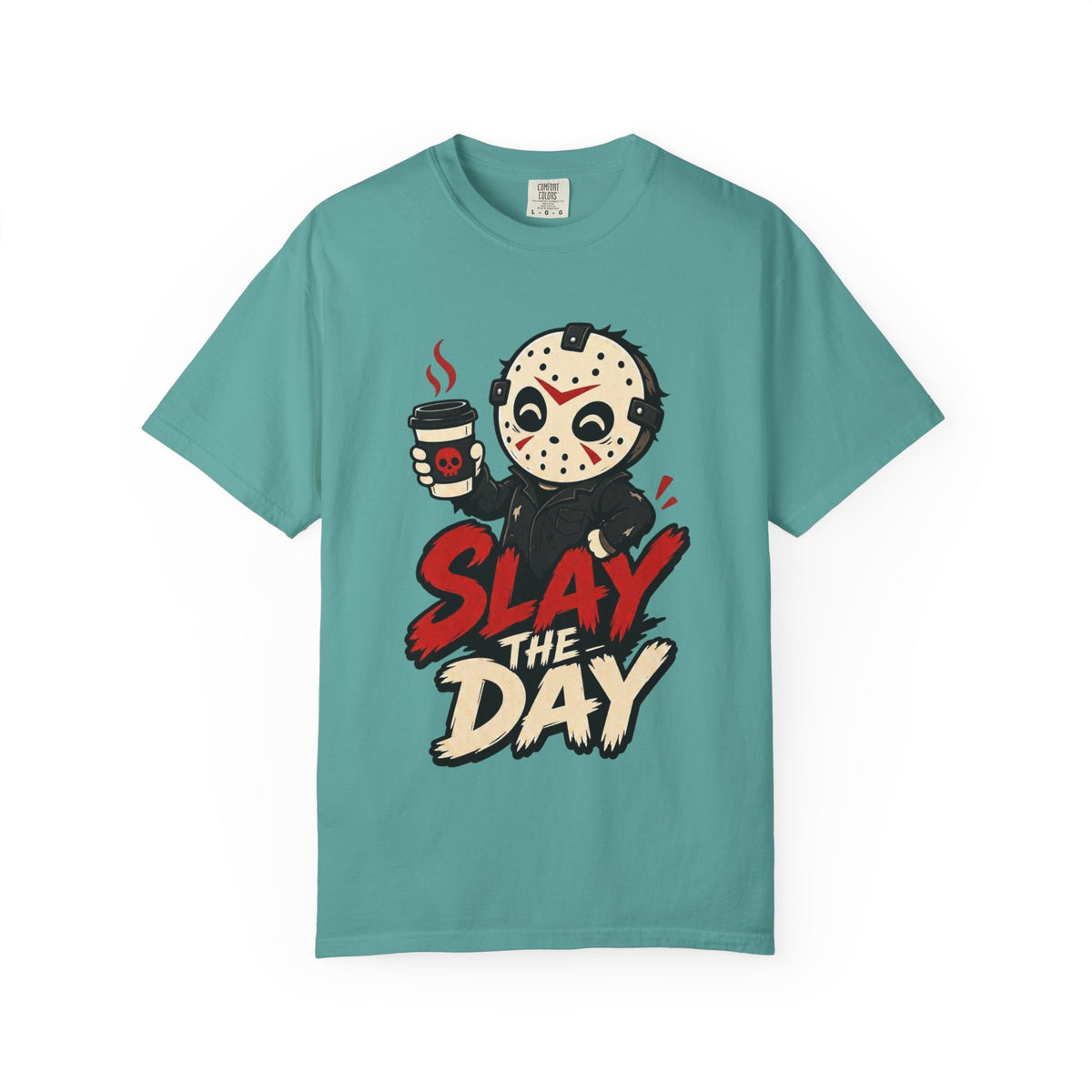 A teal short-sleeve crewneck t-shirt featuring a graphic print of a cute halloween character holding a coffee cup with the text 'SLAY THE DAY' in red and beige lettering.