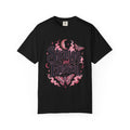 A black short-sleeve crewneck t-shirt featuring a central graphic with the words 'Strange and Ethereal' in a dark gothic font, surrounded by pink and red butterflies, crescent moons, and sparkles.