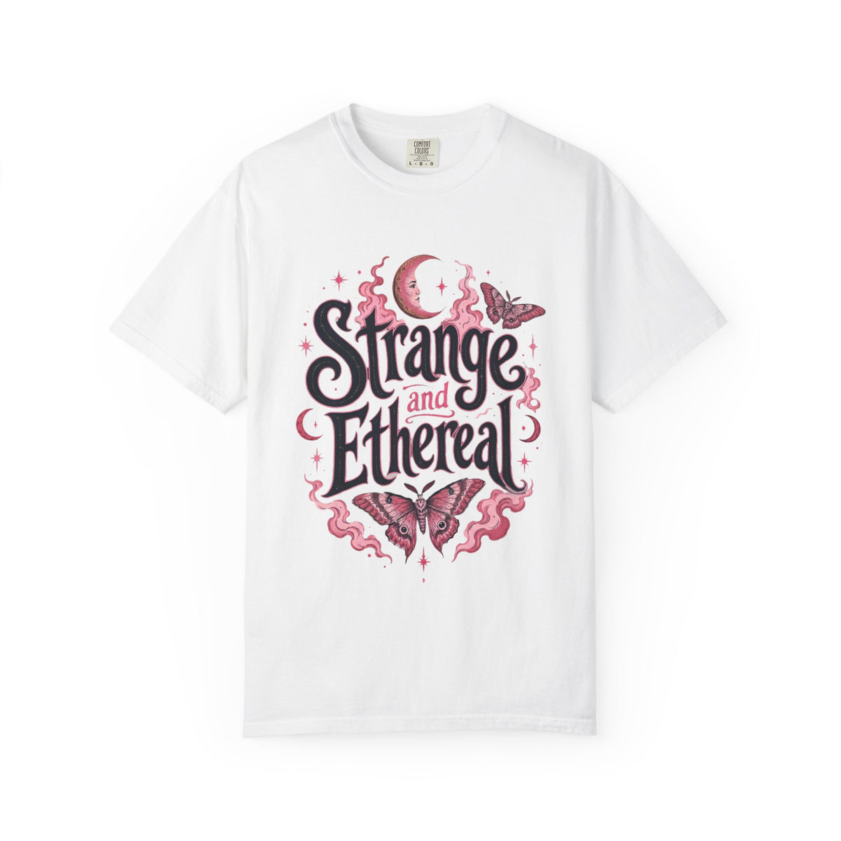 A white short-sleeve crewneck t-shirt featuring a central graphic with the words 'Strange and Ethereal' in a dark gothic font, surrounded by pink and red butterflies, crescent moons, and sparkles.