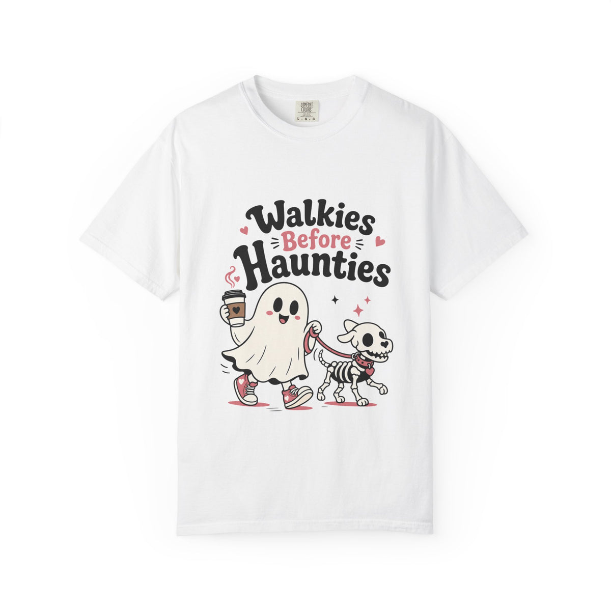 A white short-sleeve crewneck t-shirt featuring a cute graphic print of a cartoon ghost and a skeleton dog walking together, with the text 'Walkies Before Haunties' above them.
