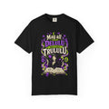 A black short-sleeve crewneck t-shirt featuring a central graphic with the words 'Strange and Ethereal' in a dark gothic font, surrounded by pink and red butterflies, crescent moons, and sparkles.