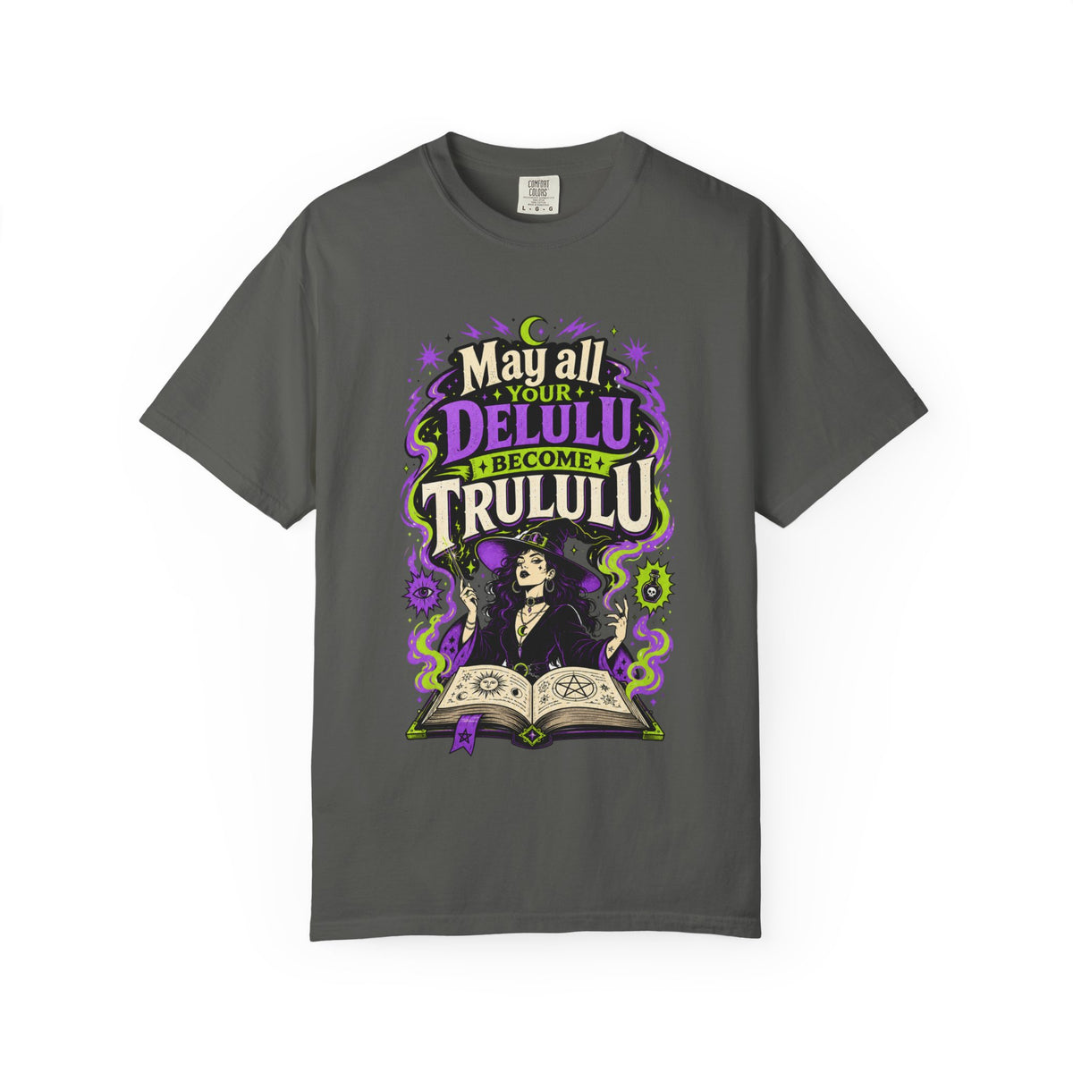 A dark gray short-sleeve crewneck t-shirt featuring a central graphic with the words 'Strange and Ethereal' in a dark gothic font, surrounded by pink and red butterflies, crescent moons, and sparkles.