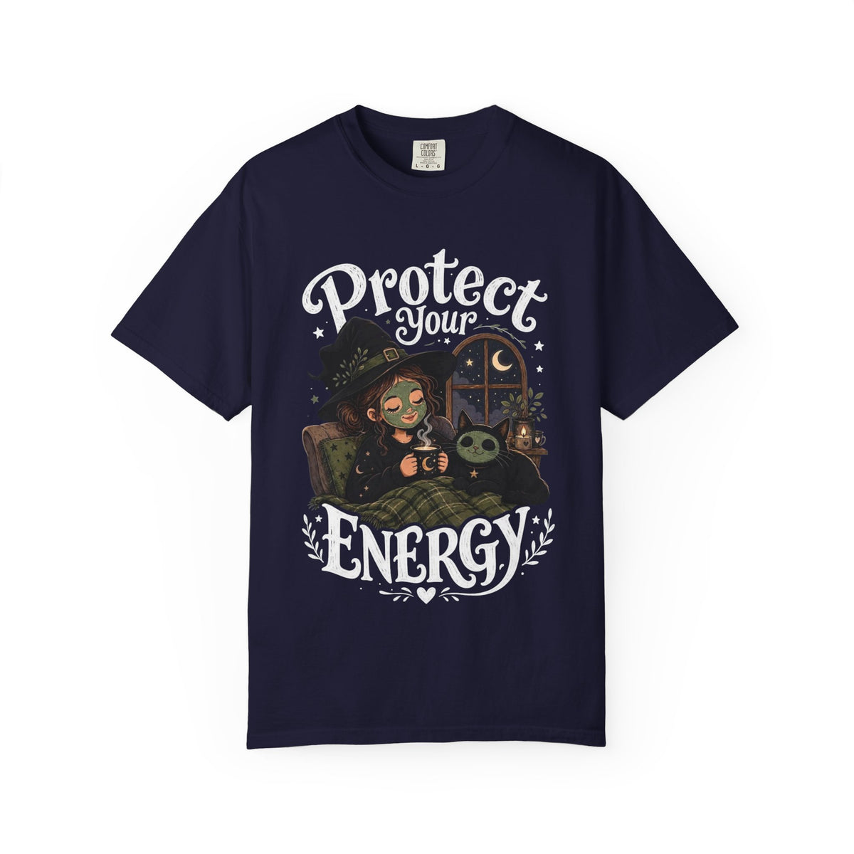A navy blue short-sleeve crewneck t-shirt featuring a graphic showing a cartoon witch sitting in bed with her cat, both wearing spa face masks, under a window with crescent moon, with the text 'Protect Your Energy' written in a gothic font.